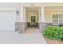 Attractive front door with stone accents and a welcoming entrance at 1109 Bunch Dr, Statesville, NC 28677