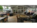 Spacious covered deck with outdoor dining area and seating at 6641 Monford Dr # 54, Conover, NC 28613