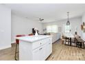 Open-concept living space featuring an island kitchen flowing into dining and living areas at 1066 Mclain Rd # 14, Kannapolis, NC 28083