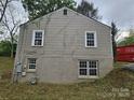 Rear exterior of the house, revealing multiple windows on the building at 435 W Sharpe St, Statesville, NC 28677