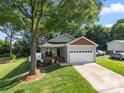 Charming single-Gathering home with a well-maintained lawn and an attached two-car garage at 6578 Bopre Ln, Denver, NC 28037