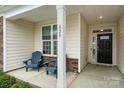 Inviting front porch featuring blue Adirondack chairs and a view of the house number, 829 at 829 River Park Rd, Belmont, NC 28012