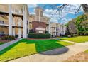 Well-maintained apartment complex features manicured landscaping and brick accents at 18631 Harborside Dr, Cornelius, NC 28031