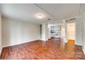 Open-concept room with hard floors, seamlessly blending into a functional kitchen at 275 N Garrison Rd, Rock Hill, SC 29730