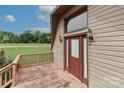 Exterior view featuring front door and deck at 443 Troutman Farm Rd, Statesville, NC 28677
