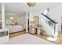 Open entryway with a staircase and hardwood floors at 655 Powder Horn Ln, Indian Trail, NC 28079