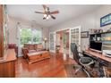 Cozy home office with hardwood floors, large window, and french doors at 12832 Heath Grove Dr, Huntersville, NC 28078
