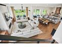 Spacious living room with great natural light, open to the gourmet kitchen and outdoor living at 14210 Kershaw Cir # 20, Huntersville, NC 28078