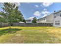 Large, well-maintained backyard, perfect for outdoor activities and relaxation at 14501 Asheton Creek Dr, Charlotte, NC 28273