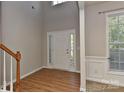 Bright entryway with hardwood floors, a white door, and ample natural light at 14501 Asheton Creek Dr, Charlotte, NC 28273