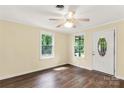 Inviting living room with two windows and wood-look floors, filled with natural light at 315 Rivers St, Rock Hill, SC 29730