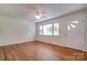 Living room featuring hardwood floors, a ceiling fan, and natural light at 504 Forest Ridge Dr, Shelby, NC 28152