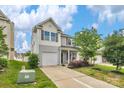 Charming two-story home featuring an attached one-car garage and well-maintained landscaping at 1177 Bannockburn Ave, Rock Hill, SC 29732