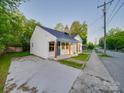 Well-maintained home with a neat front lawn, newly painted exterior and a wide driveway at 123 Oak St, Chester, SC 29706