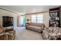 Cozy living room featuring neutral tones, comfortable seating, and a functional layout at 161 Crystal Bay Dr, Mooresville, NC 28115