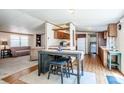 Open-concept layout with a seamless flow between the kitchen and living area at 161 Crystal Bay Dr, Mooresville, NC 28115