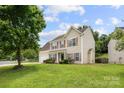 Exterior view of home with beautiful lawn and mature trees at 4004 Shasta Cir, Clover, SC 29710