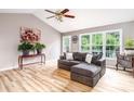 Bright living room with vaulted ceilings, wood floors, and natural light at 4470 W Bandys Cross Rd, Claremont, NC 28610