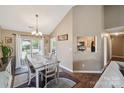 Inviting dining area with a sliding glass door providing natural light and patio views at 8105 Castlemaine Dr, Matthews, NC 28104