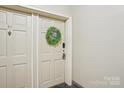 Inviting entrance featuring a front door adorned with a decorative wreath for a warm welcome at 1121 Myrtle Ave # 72, Charlotte, NC 28203