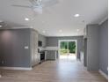 Bright kitchen with modern appliances, gray cabinets, and sliding glass doors at 251 Hall Spencer Rd, Catawba, SC 29704