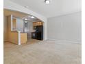 Open concept living room that seamlessly flows into a well-equipped kitchen, perfect for modern living at 4226 Lotts Pl, Rock Hill, SC 29732