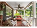 Inviting front porch with comfortable seating, ceiling fan, and classic white railing, perfect for relaxing at 512 Forest Ln, Rock Hill, SC 29730