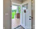 Welcoming entryway featuring a bright front door and a glimpse of the front porch at 6650 Highway 341 Hwy, Kershaw, SC 29067