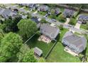 Aerial view showcasing a home with a fenced backyard and patio area in a neighborhood setting at 1016 Spanish Moss Rd, Indian Trail, NC 28079