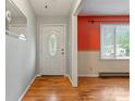 Bright foyer featuring hardwood floors and a decorative glass front door at 1405 8Th Nw Ave, Conover, NC 28613