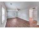 Bright living room with hardwood floors and a ceiling fan at 2214 Grimes St, Charlotte, NC 28206