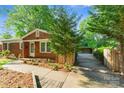 Beautiful front exterior showcasing the brick facade and landscaped walkway to the entrance at 2953 Enfield Rd, Charlotte, NC 28205