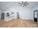 Bright living space with vaulted ceiling, hardwood floors, open to kitchen, great for entertaining at 315 W Hoke W St, Landis, NC 28088