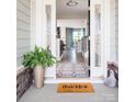 Inviting front porch with decor and view of the home's interior at 5107 Raging Creek Dr, Indian Trail, NC 28079