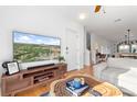 Inviting living room featuring a modern TV and stylish wooden console table at 511 Donatello Ave, Charlotte, NC 28205