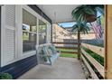 Inviting porch with swing, perfect for relaxing and enjoying the outdoors at 8007 Maxwelton Dr, Huntersville, NC 28078