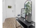 Inviting entryway with stylish decor, setting a welcoming tone for the home at 102 W Georgia Ave, Bessemer City, NC 28016