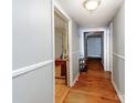 Hallway featuring hardwood floors and neutral wall colors at 106 Deaver St, Chester, SC 29706
