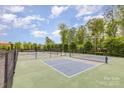 Well-maintained pickleball courts with lush green surroundings, perfect for active recreation at 1905 Tranquility Blvd, Lancaster, SC 29720