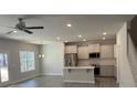 Bright and airy kitchen featuring stainless appliances, granite countertops and center island for extra seating at 2924 Noritake Trl # 67, Albemarle, NC 28001