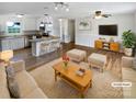 Open-concept living space with a modern kitchen, creating an inviting and stylish atmosphere at 7308 Pleasant Hill Church Rd, Marshville, NC 28103