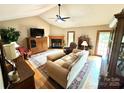 Cozy living room featuring a fireplace, hardwood floors, and a neutral color palette at 675 Godbey Rd, Salisbury, NC 28147