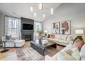 Elegant living room with fireplace, modern lighting, and stylish furnishings at 7513 Lancaster Hwy # 6, Waxhaw, NC 28173