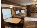 Living room and dinette seating makes a great place to gather with friends and Gathering at 131 Twin Bluff Trl, Mount Gilead, NC 27306