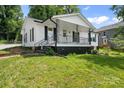 Lovely single-Gathering home with a welcoming front porch and a lush green lawn at 1746 2Nd Street Sw Pl, Hickory, NC 28602