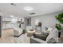 Open-concept living area with kitchen, featuring modern furniture, decor, and ample light at 1746 2Nd Street Sw Pl, Hickory, NC 28602