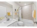 Contemporary bathroom with a tub-shower combo, stylish vanity, and neutral tile work at 3748 Ellington St, Charlotte, NC 28211