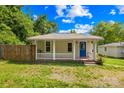 Charming single-story home featuring a covered front porch and a bright blue front door at 485 Lincoln St, Cramerton, NC 28032