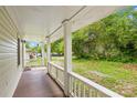 Covered front porch with views of the home's front yard at 485 Lincoln St, Cramerton, NC 28032