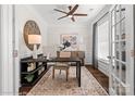 Inviting office with a work desk, large clock, ample storage, and abundant natural light, ideal for focused work at Lot 003 Bozeman Ct # 3, Stanley, NC 28164